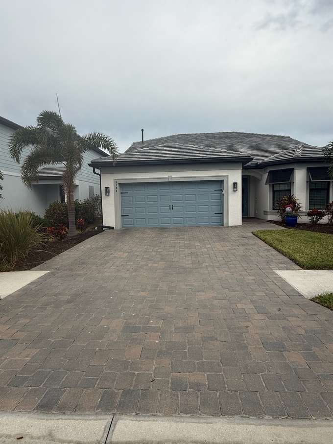 Paver surface before cleaning and sealing in Sarasota FL