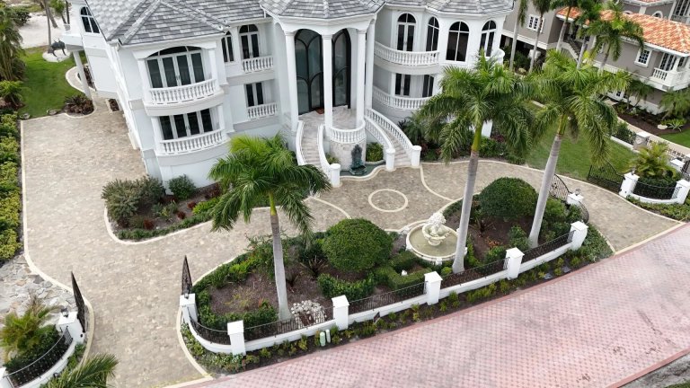 Custom paver courtyard and driveway - Paver Design Center, Sarasota FL