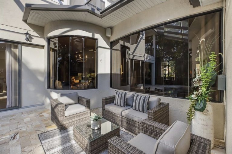Pool-side lanai and outdoor living area - Paver Design Center, Sarasota FL