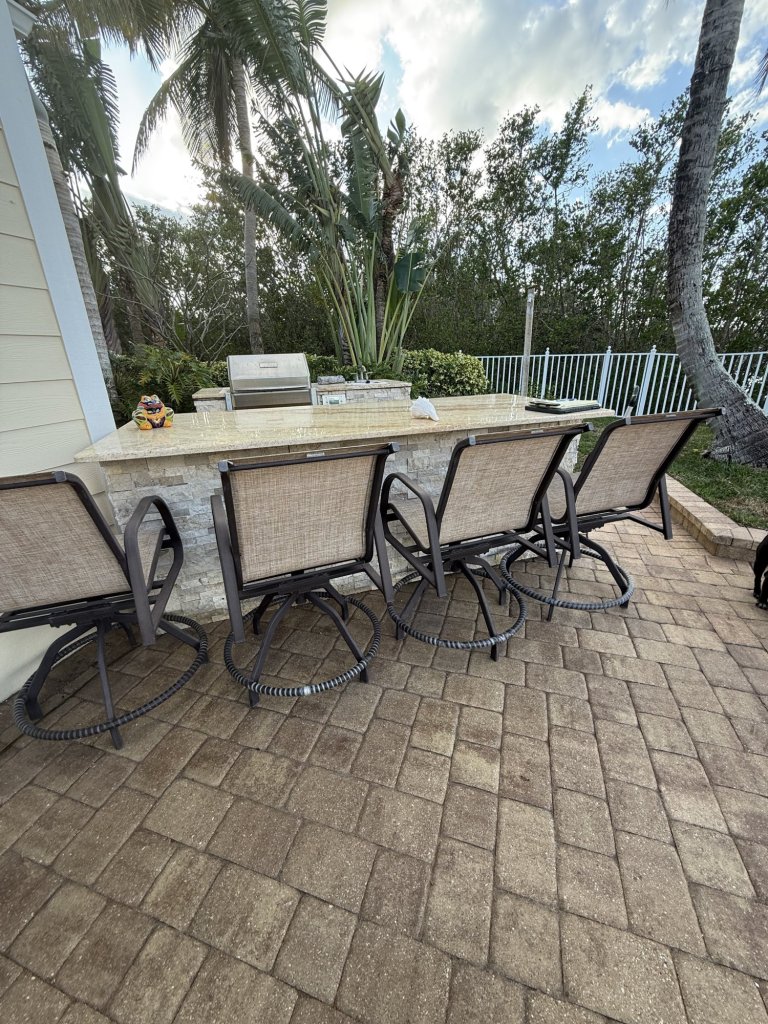 Outdoor kitchen and bar on a paver deck - Paver Design Center, Sarasota FL